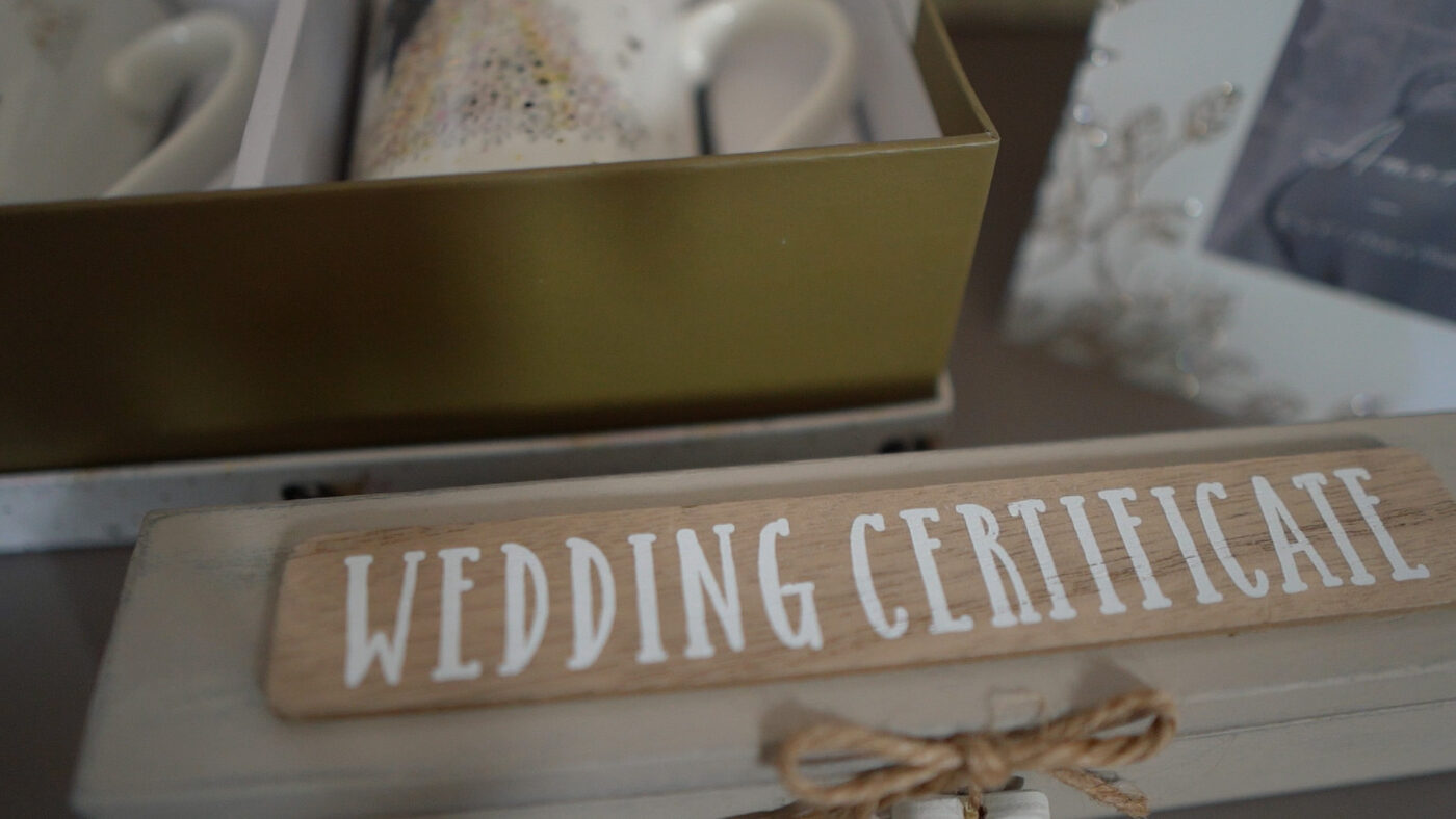 Signing the register at a Derry / Londonderry wedding ceremony